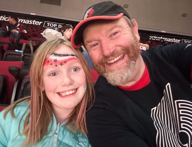 Brad and his daughter at a Blazers game
